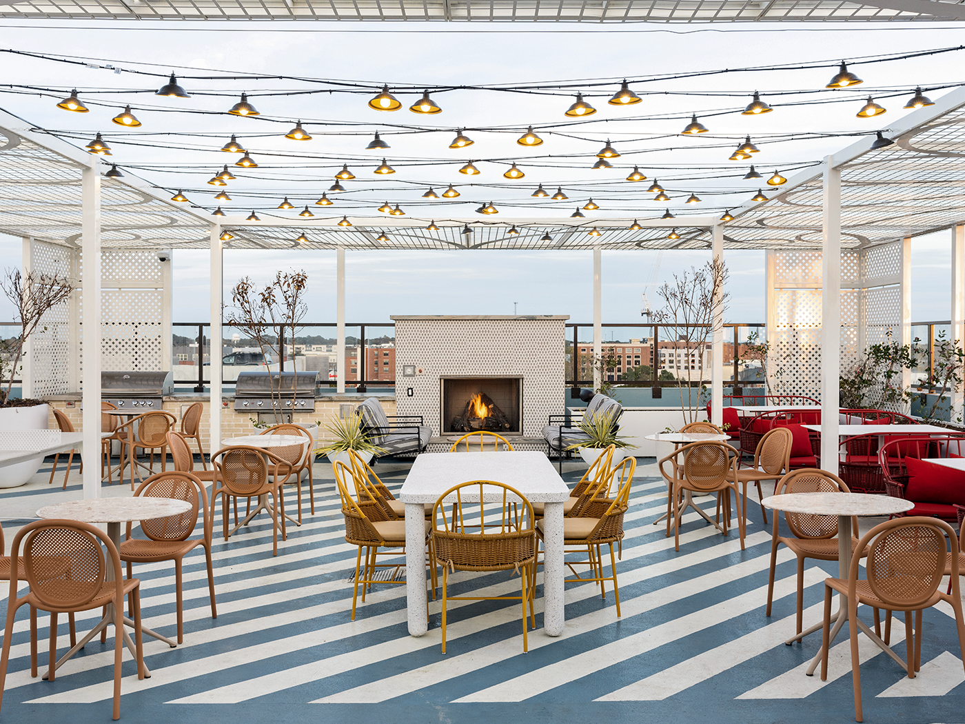 Lounge area with chairs and a fireplace