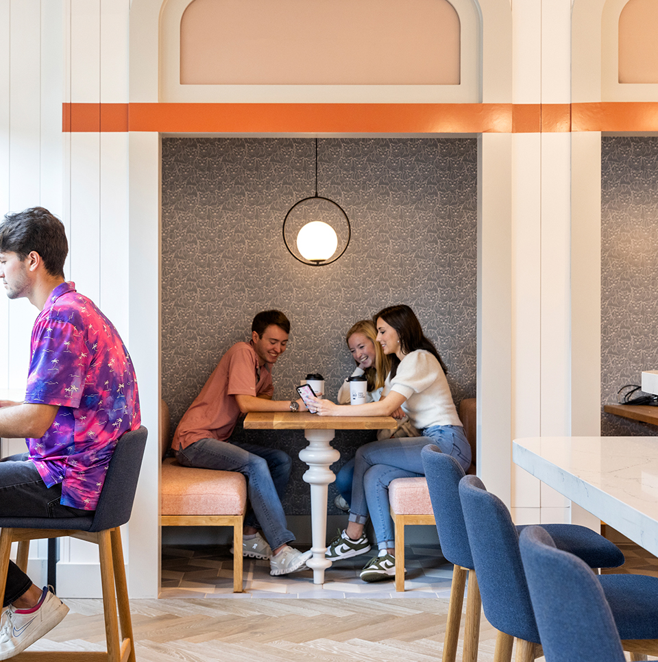 A group of friends sitting at a table